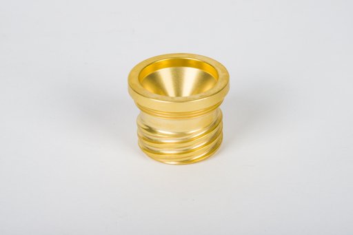 Gold-colored cylindrical component with a tapered internal recess and circumferential grooves.